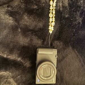 Sony Black Digital Camera with Beaded Strap